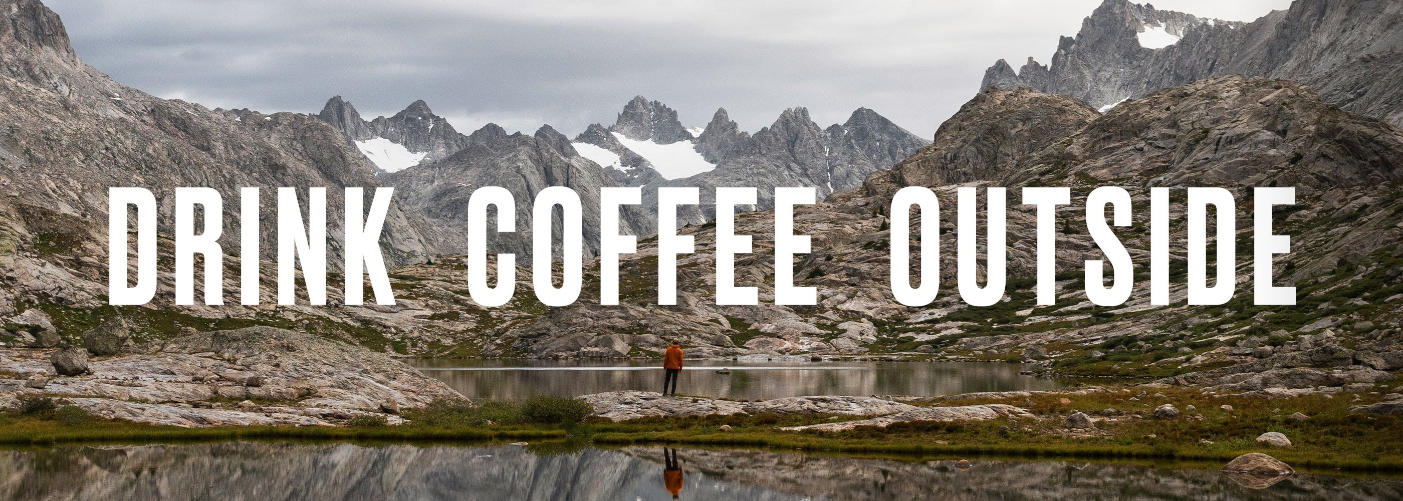 VSSL Drink Coffee Outside Hiker Outside Viewing Mountain Range by Lake